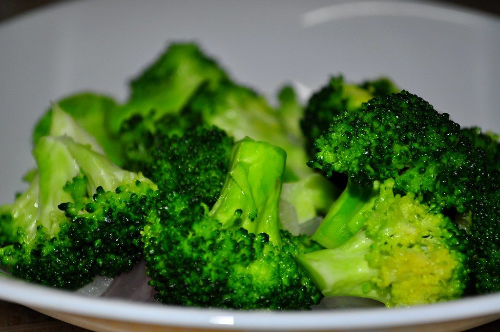 Fresh broccoli, representing nutrition-first everyday wellness alongside supplements